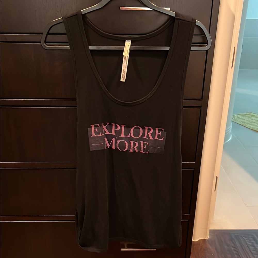 Free people movement, tank, explore more, twist side, size large